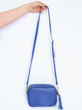 Leather bag with fringe pendant